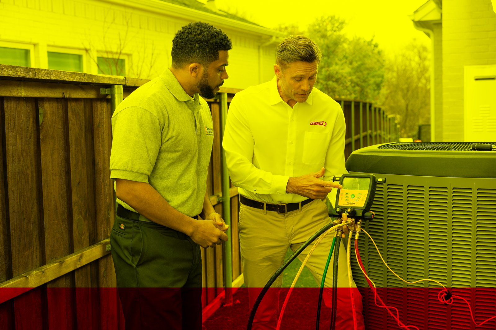 Lennox outdoor central A/C condenser installed at a residential home